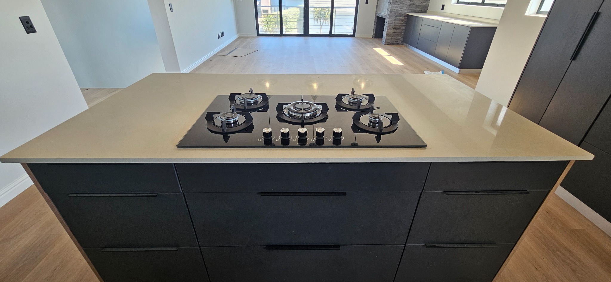 Gas hob fitted into a kitchen island
